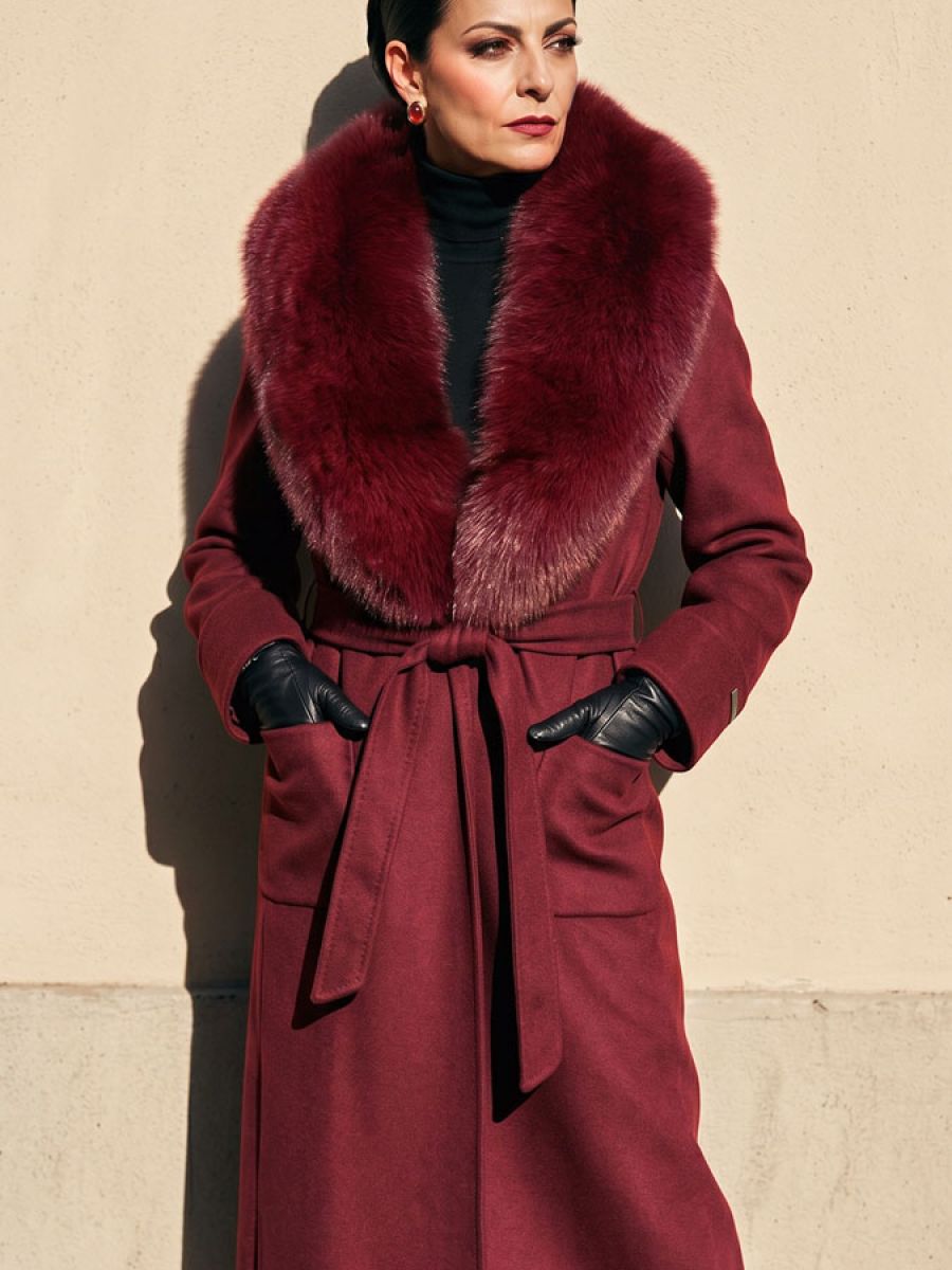 Coat crafted from 70% wool and 30% cashmere, with a wide polar fox fur collar.